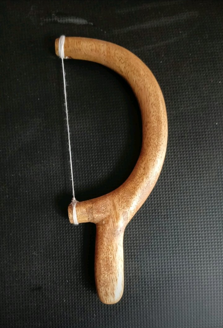 Actual wooden B.O.D Bow of David Floss Pick